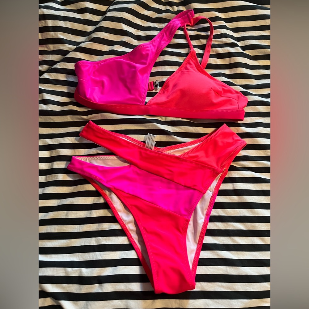 Brand new, hot pink and orange one shoulder bikini. Only tried on